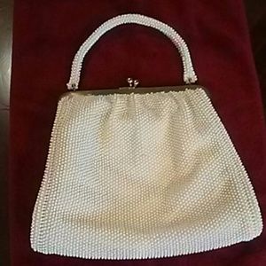 Lumured white beaded purse